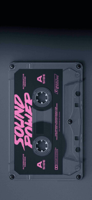 A close-up of a grey transparent cassette tape with 'SOUND POWER' written in bold pink letters on a dark minimalist background.