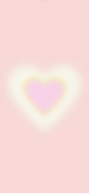Soft pink glowing aura heart with grainy texture on a pastel background.