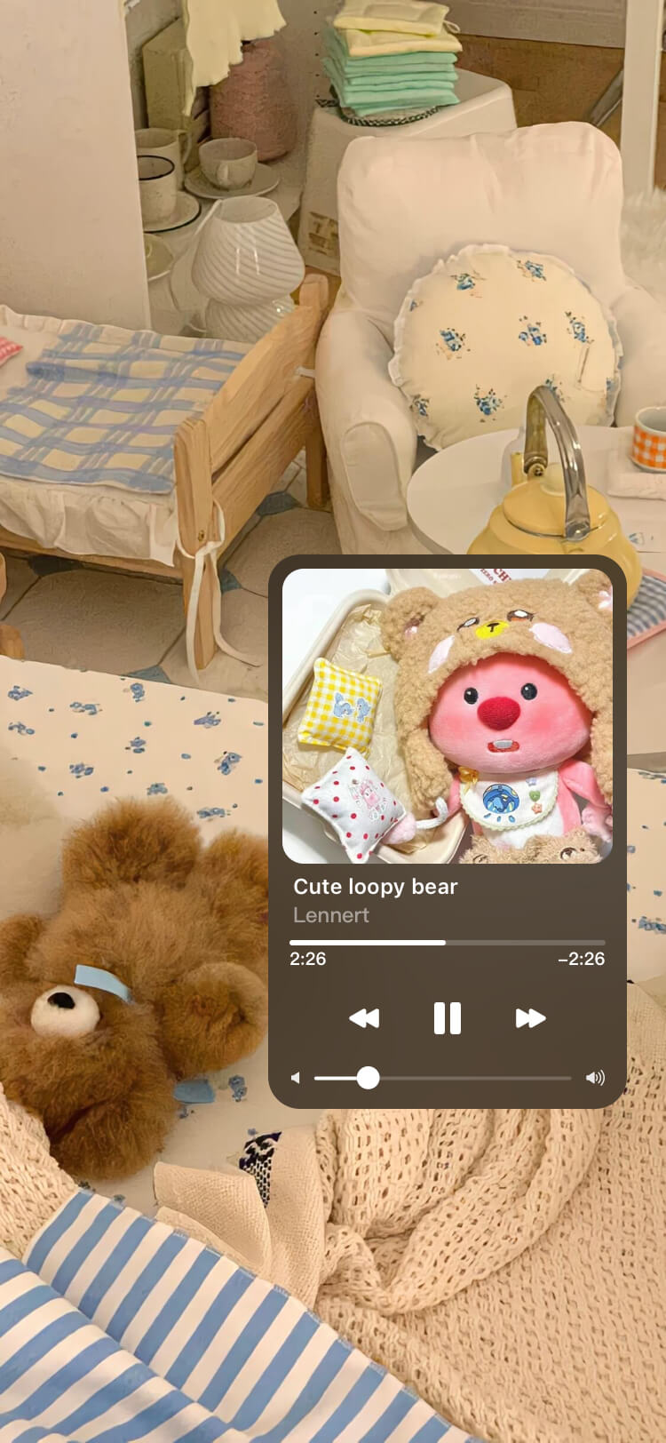 Custom DIY wallpaper template featuring a cute Loopy bear plushie and aesthetic music player widget in a cozy bedroom.