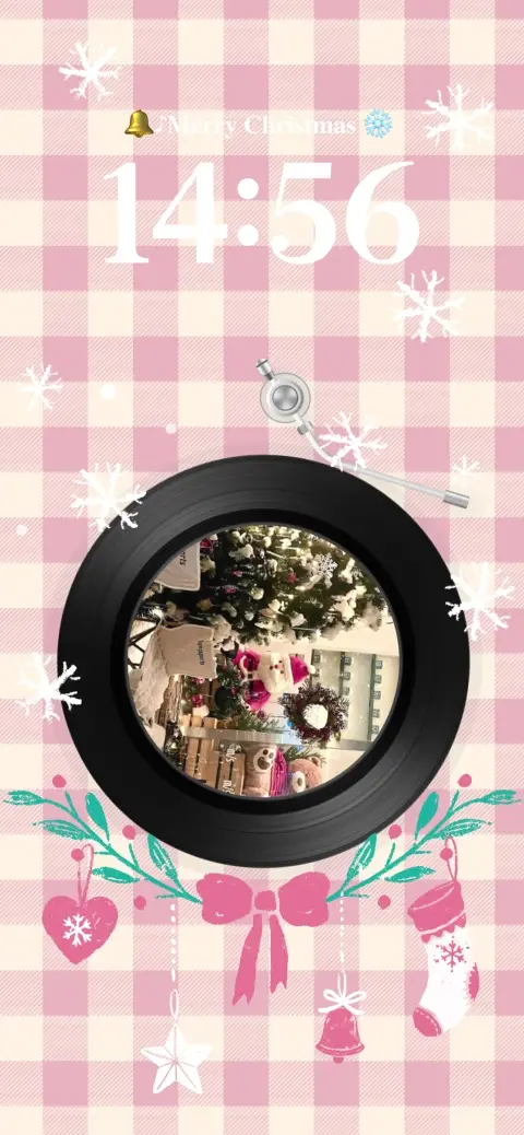 Pink gingham Christmas live wallpaper template featuring a spinning vinyl record with a festive tree and snowflakes.