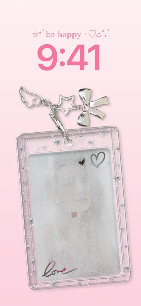 Pink photocard holder with silver star and bow keychain on a soft pink background for a mobile live wallpaper template.