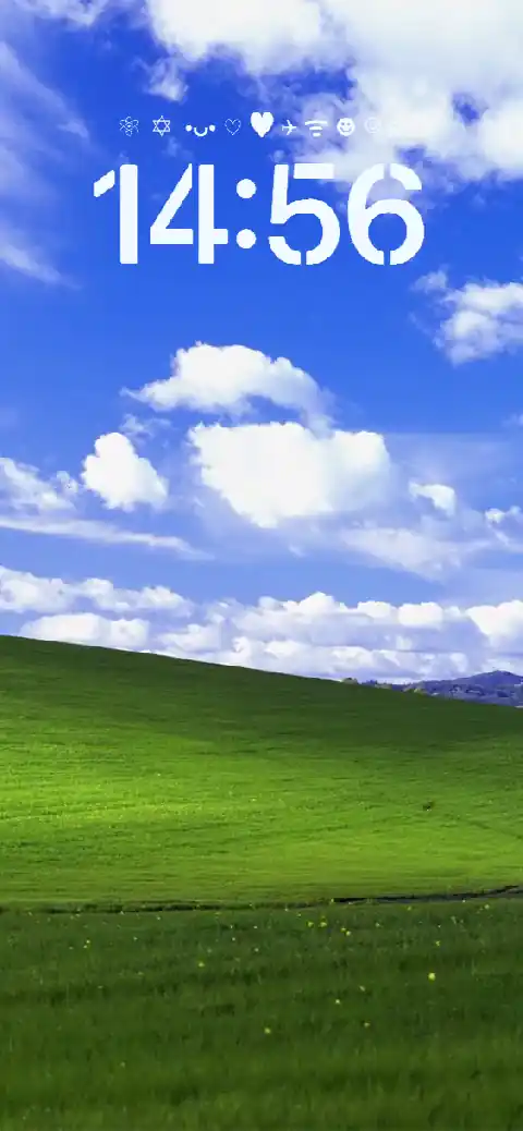 Modèle de fond d'écran animé personnalisable avec paysage de colline et ciel bleu style Windows XP.