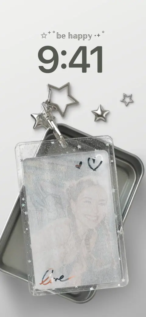 K-pop photocard holder live wallpaper template with glitter stars and aesthetic be happy text on phone screen.