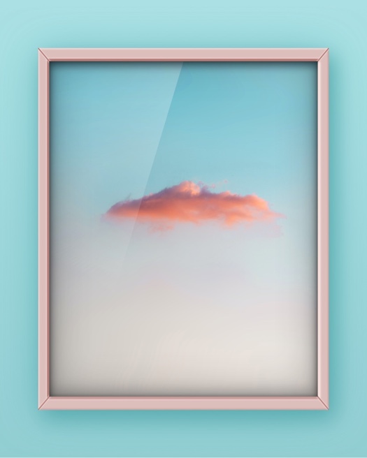 A vertical pink photo frame on a teal background displaying a single photo of a pinkish-orange cloud in a clear sky with a glass reflection effect.