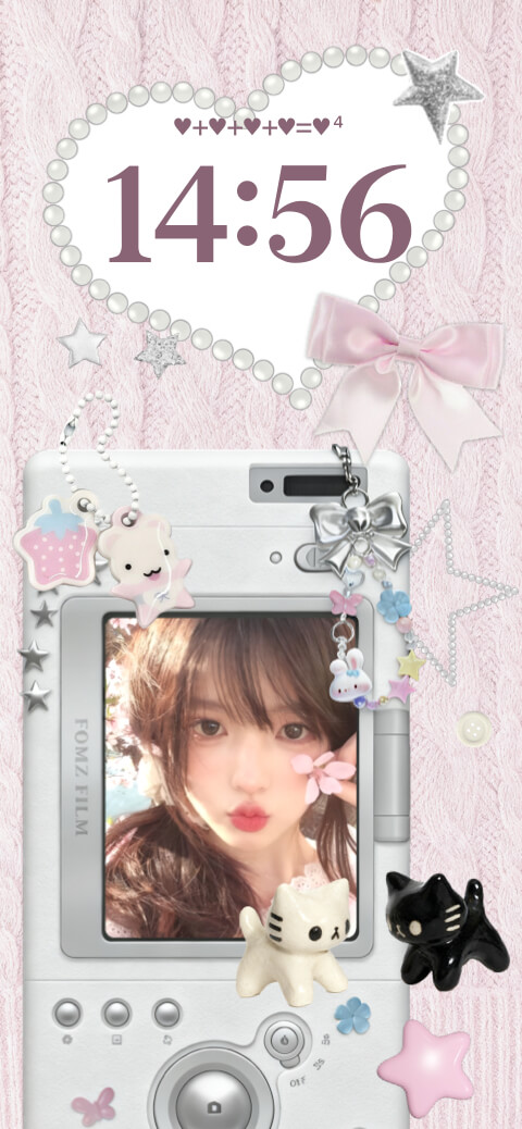 A customizable pink coquette wallpaper template featuring a white digital camera photo frame, a pearl heart clock area, and a pink cable-knit background with cute charms.